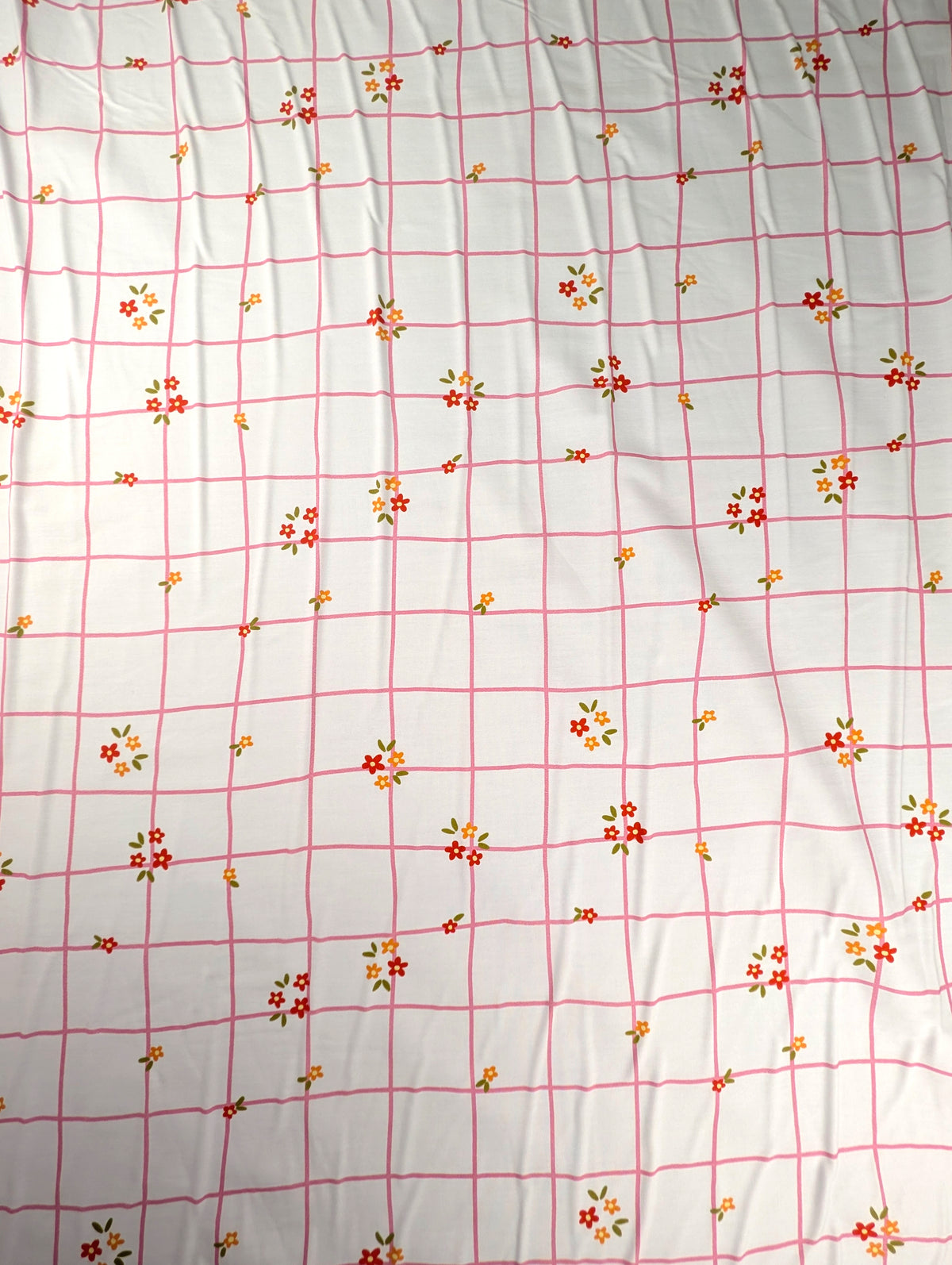 Cotton poplin, pink check and wildflower pattern 5 [blankastock:7f5ee6a4-5b2e-459a-9b11-18d40d4ed39e]
