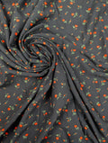 Viscose Ecovero, petites fleurs orange sur fond noir 1 [blankastock:3963ffec-667a-42ce-bb10-122bb150bfa0]